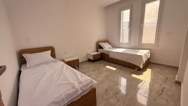 Résidence - 3 maisons avec piscines communes